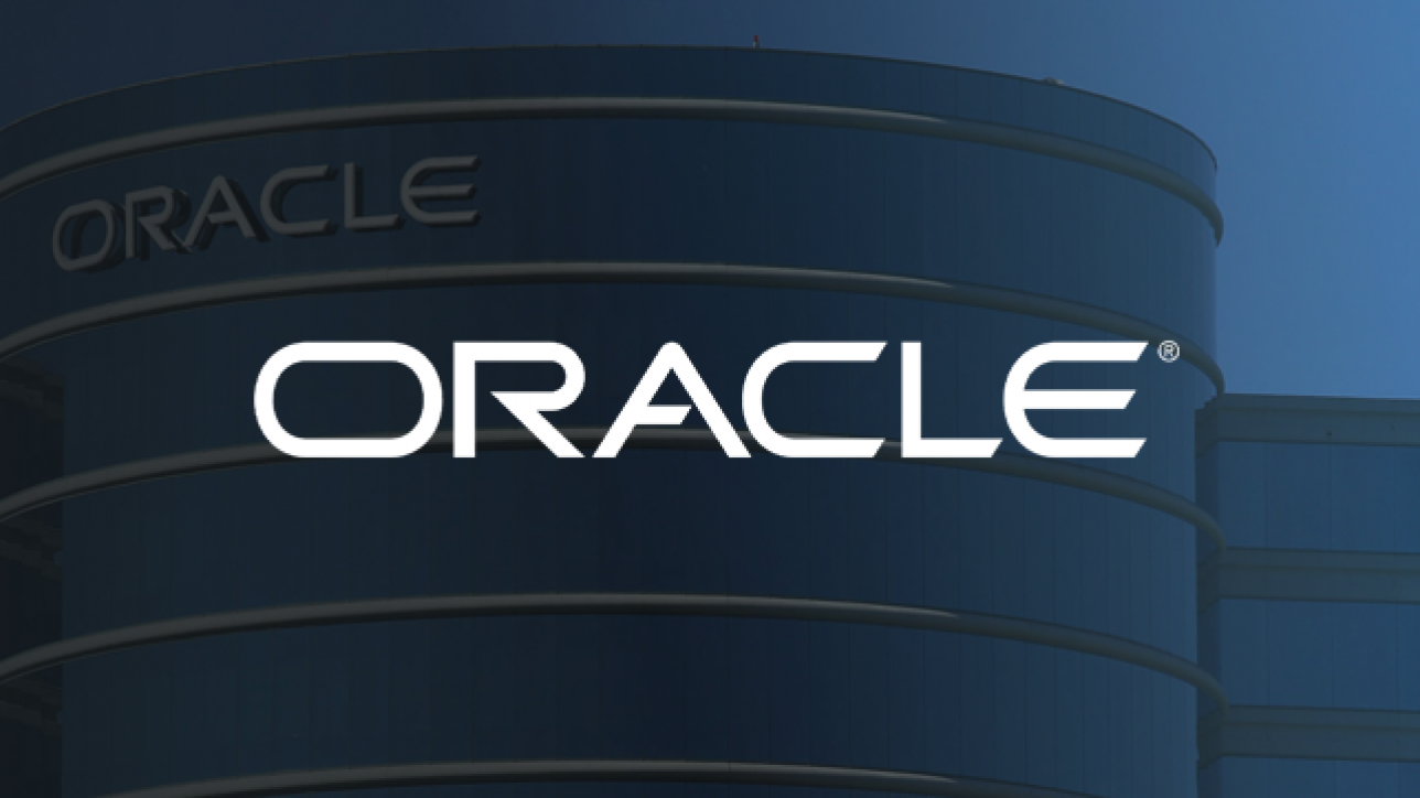 Oracle logo on a blue background of their office building